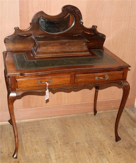 A late Victorian mahogany and beech writing table W.92cm